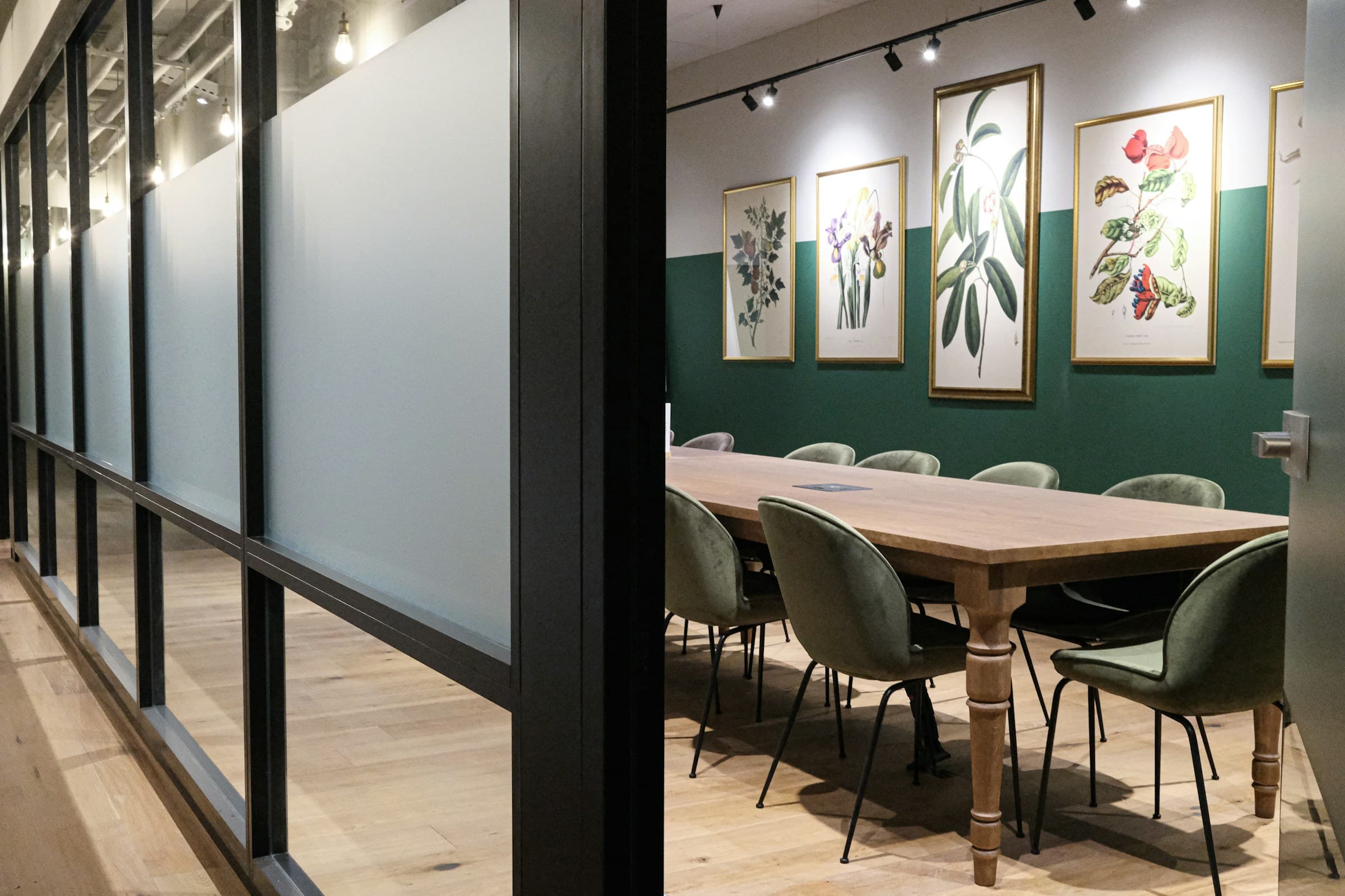 A meeting room with botanical prints
